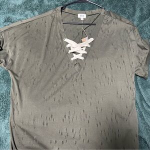 Distressed lace up buckle top